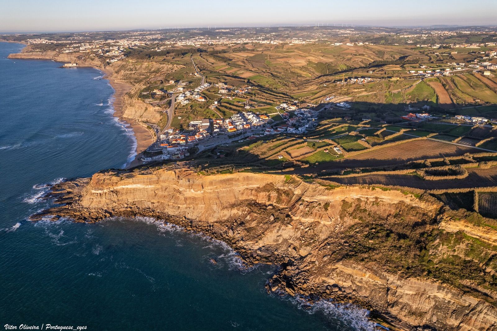 Aerial view of the cliffs and beaches south of Porto Dinheiro