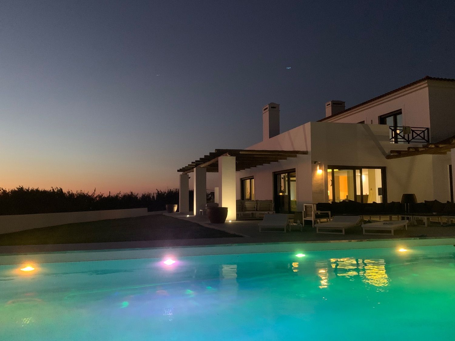 The pool lit up at night